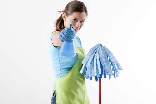 Cleaning technician preparing carpet cleaning equipment