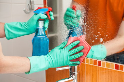 Commercial cleaners working in a Lambeth office reception area