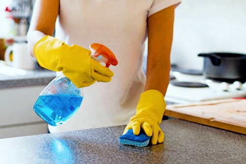 Cleaning team working in a mixed-use building corridor in Lambeth
